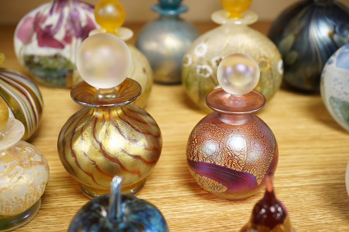 Eleven Isle of Wight studio glass scent bottles and stoppers and a similar apple and pear shaped studio paperweight, tallest scent bottle 13cm high